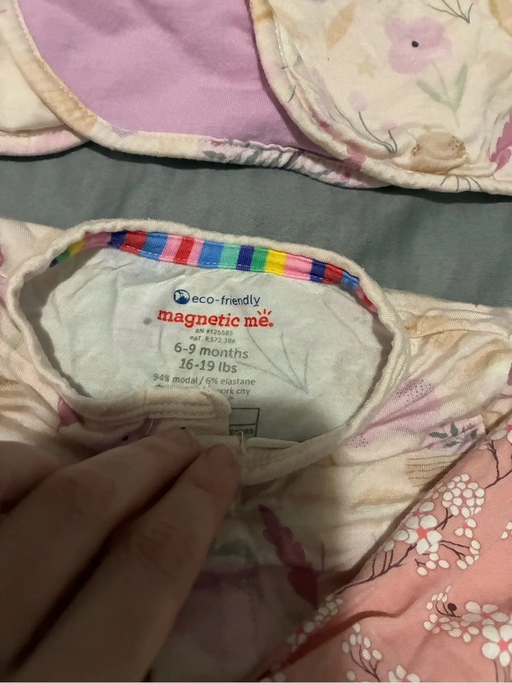 3 magnetic me modal footsies and 6 magnetic me bibs.